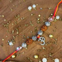 Rudraksha Rakhi Bracelet with OM Hanging Charm