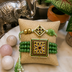 Pair of Handcrafted Emerald Kundan Rakhis with Green Beads