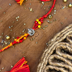 Ganesha Metal Charm Rakhi Bracelet