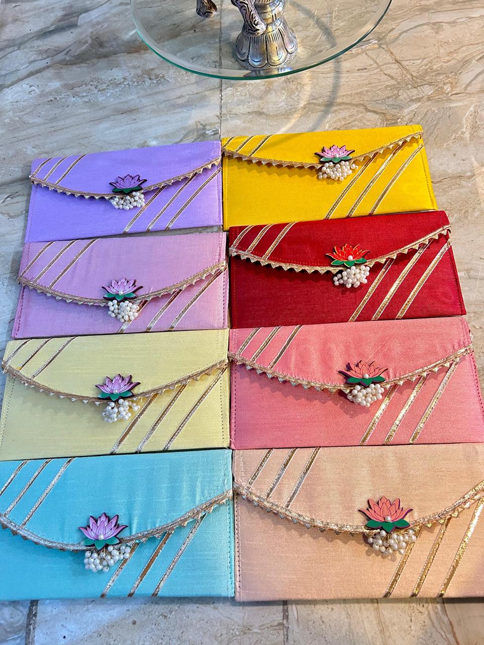 Vibrant Colour Envelopes with Lotus Charm