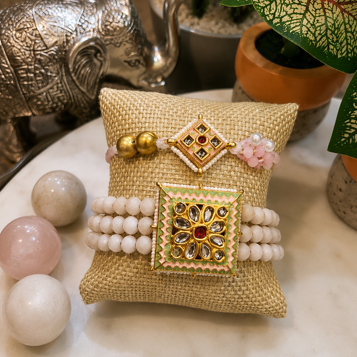 Pair of Handcrafted Blush Kundan Rakhis with Pearl Beads