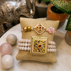 Pair of Handcrafted Blush Kundan Rakhis with Pearl Beads