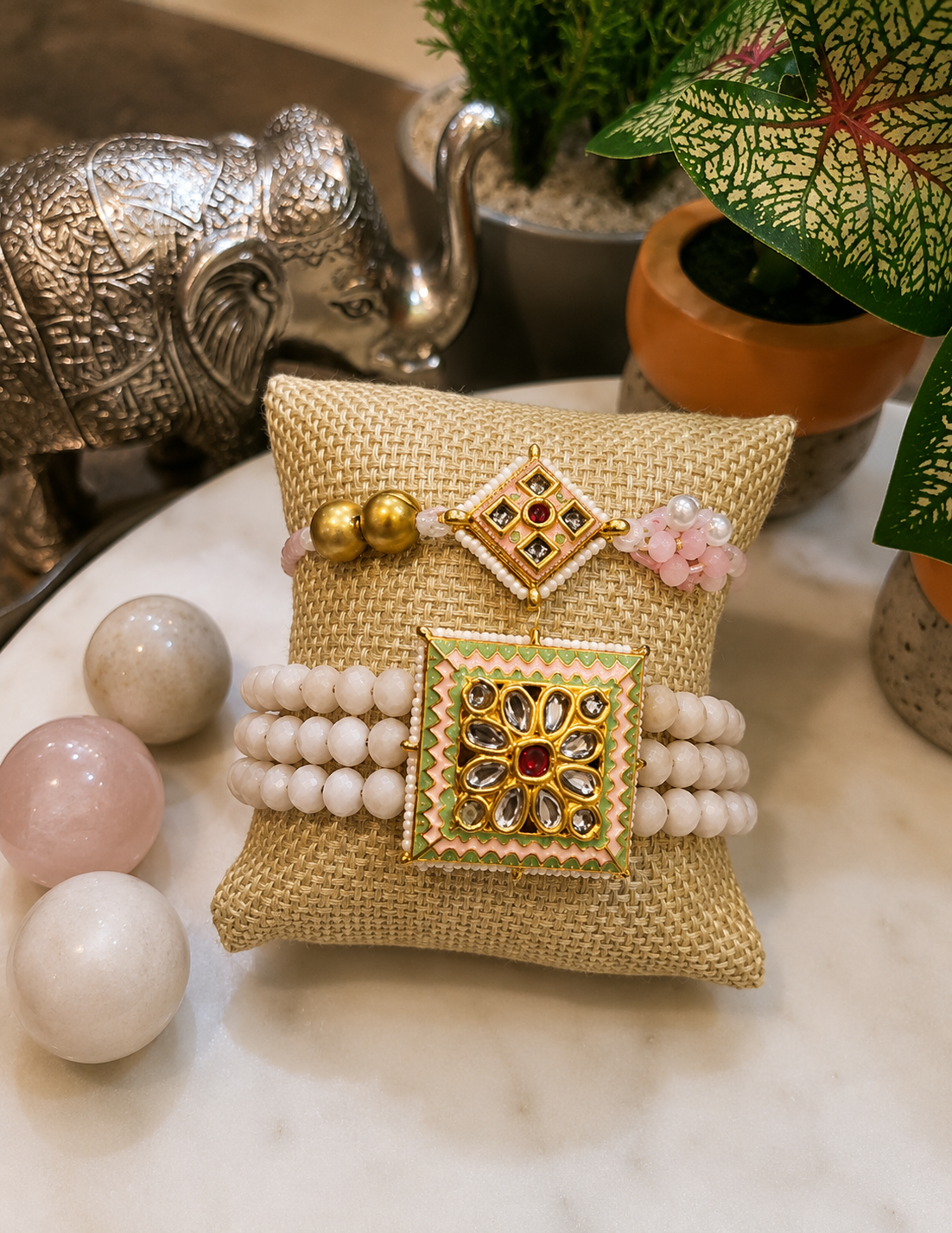 Pair of Handcrafted Blush Kundan Rakhis with Pearl Beads
