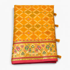 Vibrant Yellow Patan Patola Saree with Red Traditional Border
